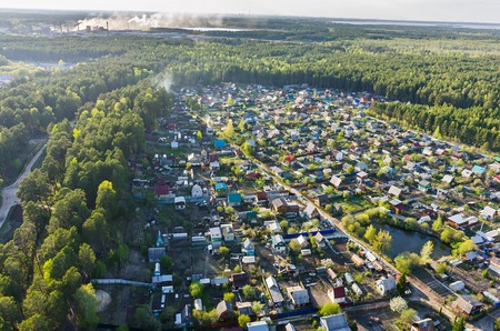 Vinzili, Russia - May 13, 2015: View onto dacha cooperative of Tyumen region in spring timeの写真素材