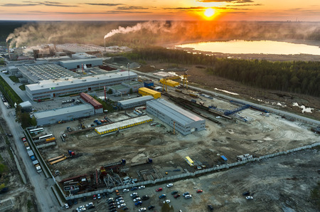 Vinzili, Russia - May 13, 2015: Bird eye view onto JSC Tyumenstalmost factory at sunset. Tyumen regionのeditorial素材