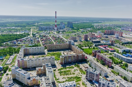 Tyumen, Russia - May 25, 2015: Aerial view on Voynovka residential area and combined heat and power factory number 2 on backgroundの写真素材