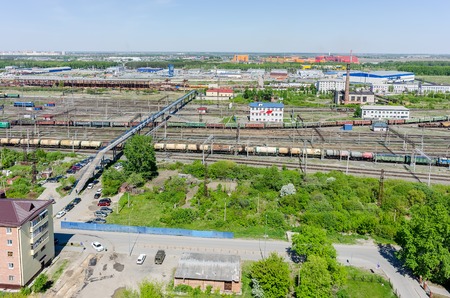 Tyumen, Russia - April 26, 2015: Aerial view on Voynovka railway node. Pedestrian bridgeのeditorial素材