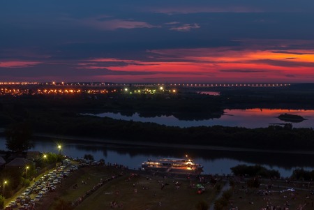 Tyumen, Russia - July 23, 2010: Evening Embankment. People expect beginning of fireworks festival
