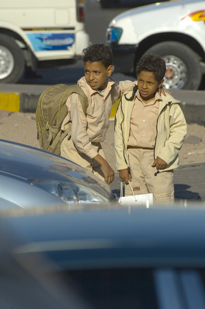 Hurghada, Egypt - November 7. 2006: Boys back home from schoolのeditorial素材