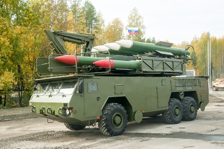 Nizhniy Tagil, Russia - September 25. 2013: Bouck M2 complex placed on wheel drive truck MZKT-69221 Medium-range surface-to-air missile systems on demonstration range. Russia Arms Expo-2013のeditorial素材
