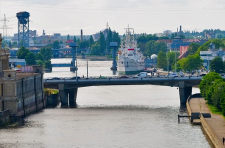 Kaliningrad, Russia - June 21, 2010: Sea ship in World Ocean museum. Bridge through Pregel river