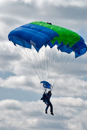 Yalutorovsk, Russia - May 24, 2008: Sport airdrome. Paratrooper woman descends and trains in landing accuracyのeditorial素材
