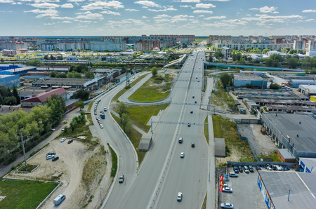 Tyumen, Russia - March 11, 2016: Bird eye view onto road intersection over railways on Montazhnikov streetのeditorial素材