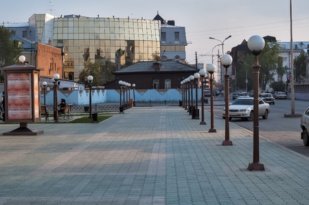 Tyumen, Russia - May 14, 2005: Square with lanterns in front of Regional philharmonic hall on Chelyuskintsev street. On background is Tyumen State Universityのeditorial素材