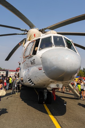 Tyumen, Russia - August 11, 2012: Air show On a visit at UTair in heliport Plehanovo. Visitors exploring the MI-26T helicopterのeditorial素材