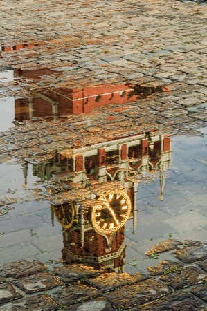 Reflection in pool of Spasskaya tower of Moscow Kremlinの写真素材