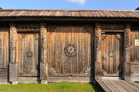 wooden door with iron handlesの写真素材
