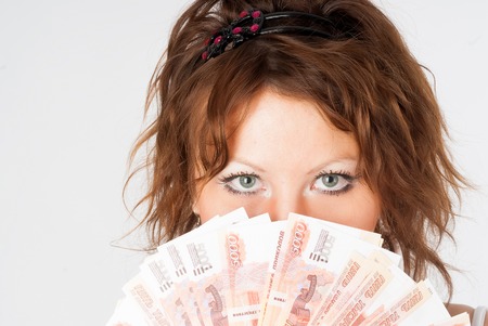 Young Lady with moneyの写真素材