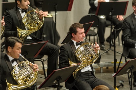 Tyumen, Russia - January 25, 2017: Concert of orchestra of the Tyumen philharmonic hall for photographers. French horn playersのeditorial素材