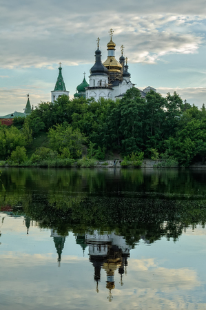Holy Trinity Monastery on Tura river bank. Church of Saints Peter and Paul and Holy Trinity Cathedralの写真素材