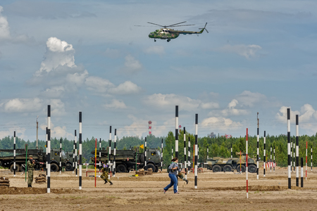 Tyumen, Russia - June 21, 2017: Army Games. Safe Route contest. Motion of military konvoyのeditorial素材