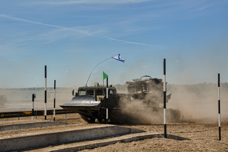 Tyumen, Russia - June 23, 2017: Army Games. Engineering Formula contest. Highest military and engineering school ground. MDK crews start speed drivingのeditorial素材