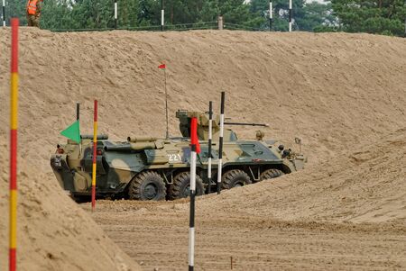 Tyumen, Russia - August 6, 2017: International Army Games. Safe Route contest. The BTR-82 amphibious armoured personnel carrier in actionのeditorial素材