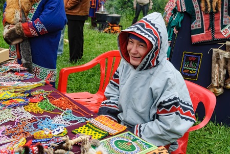 Tyumen, Russia - June 2, 2007: Holiday of nationalities. Nenets - aboriginals of the Russian North - sells national goodsのeditorial素材