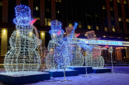 Tyumen, Russia - December 28, 2017: The shining snowmen near office Transneft Siberia. Long exposureのeditorial素材