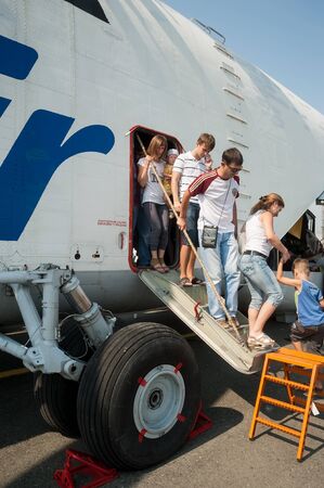 Tyumen, Russia - August 11, 2012: On a visit at UTair air show in heliport Plehanovo. People...