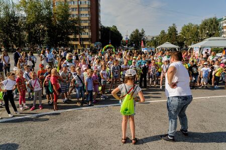 Tyumen, Russia - August 26, 2016: Open Day of Sberbank for children. The animator entertains children in show programのeditorial素材