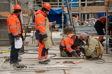 Tobolsk, Russia - May 29. 2018: Sibur company. Construction of plant on processing of hydrocarbonic raw materials. Industrial welder welding fabricated construction in factoryのeditorial素材