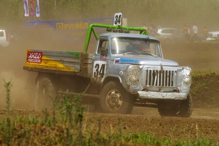 Tyumen, Russia - July 5, 2009: Championship of Russia on truck autocross in the Silkin Ravine. Truck on bend of sports trackのeditorial素材