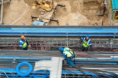 Tobolsk, Russia - May 29. 2018: Sibur company. Construction of plant on processing of hydrocarbons. Workers on construction siteのeditorial素材