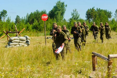 Tyumen, Russia - July 1, 2017: Race of Heroes project on the ground of the highest military and engineering school. Show of special troops warriorsのeditorial素材