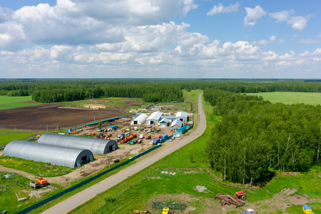 Aerial view onto modern machine yard of agricultural firm. Sverdlovsk regionの写真素材