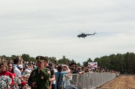 Tyumen, Russia - June 21, 2017: Army Games. Safe Route contest. Highest military and engineering school ground. Viewers on tribuneのeditorial素材