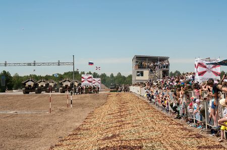 Tyumen, Russia - June 23, 2017: Army Games. Engineering Formula contest. Highest military and engineering school ground. Audience looks at competitionsのeditorial素材