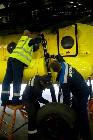 Tyumen, Russia - June 19, 2019: Aircraft repair helicopter UTair Engineering plant. Workers...