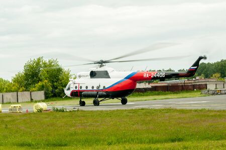 Tyumen, Russia - June 19, 2019: Aircraft repair helicopter UTair Engineering plant. Test flight of MI-8 helicopter aftr repairingのeditorial素材