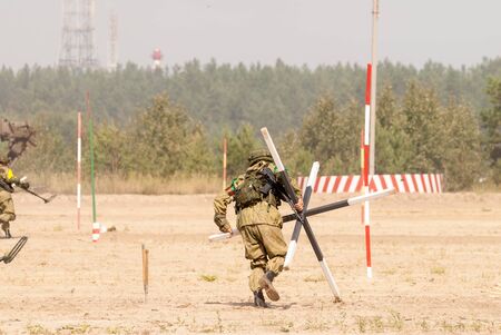 Tyumen, Russia - August 11, 2019: International Army Games. Safe Route contest. Engineer with mine...