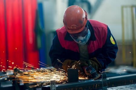 Tyumen, Russia - November 30, 2017: Man in workshop manufacturing metal in Mostootryad-36 Factory