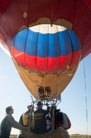 Tyumen, Russia - October 1. 2016: Hot Air Balloon starting for free flight. On the bank of the river Tura near the village of Akiyarのeditorial素材