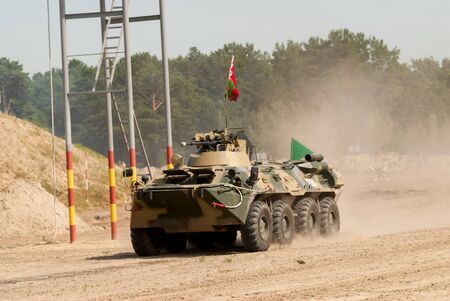 Tyumen, Russia - August 11, 2019: International Army Games. Safe Route contest. The BTR-82 amphibious armoured personnel carrier in action. Belarus teamのeditorial素材