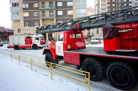 Tyumen, Russia - December 23, 2018: Borisa Oprokidneva street. Fire engines arrive at the call to...