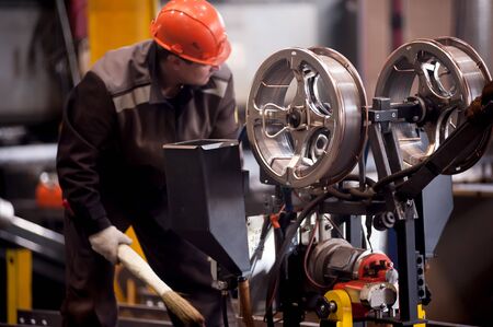 Tyumen, Russia - September 4, 2019: Worker with welder machine in Mostootryad-36 Factoryのeditorial素材
