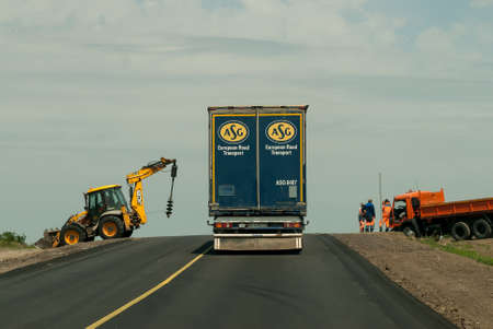 near Volgograd, Russia - July 20, 2017: Traffic with truck on intercity roadのeditorial素材