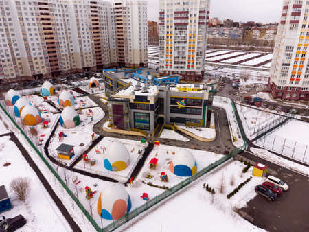Tyumen, Russia - March 29, 2021: Modern kindergarten number 186 with playground