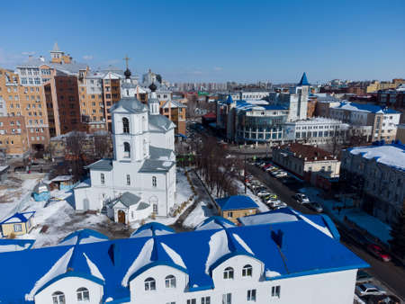 Tyumen, Russia - March 22, 2021: View at city quarters with Archangel Michael Church