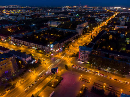 Tyumen, Russia - August 8, 2021: Melnikayte and Respubliki streets intersection in night time. Top...