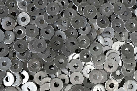 Heap of stainless steel shims. Background