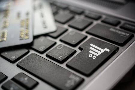Credit cards on computer keyboard - Online Shopping