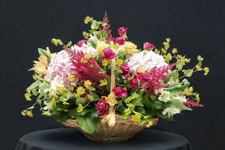 Beautiful bouquet in a basketの写真素材