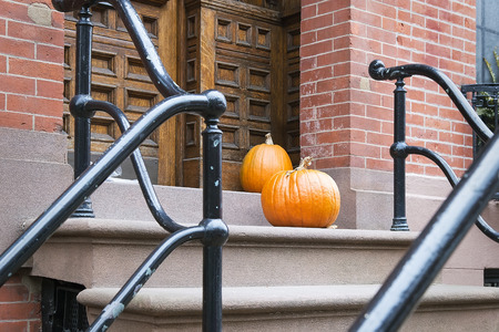 Halloween pumpkins near the door, Brooklyn New York Cityの写真素材