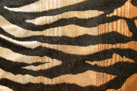 Fabric with tiger stripes pattern background texture close upの写真素材