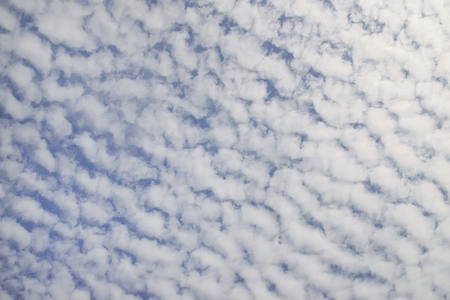 Beautiful blue sky with white clouds background