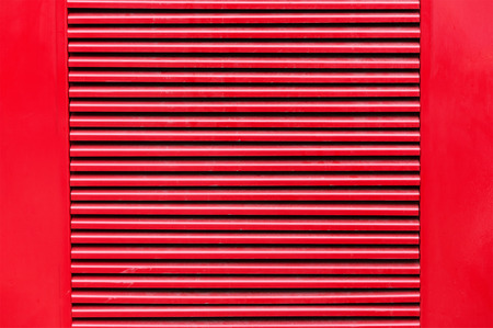 Red striped metal background texture close upの写真素材